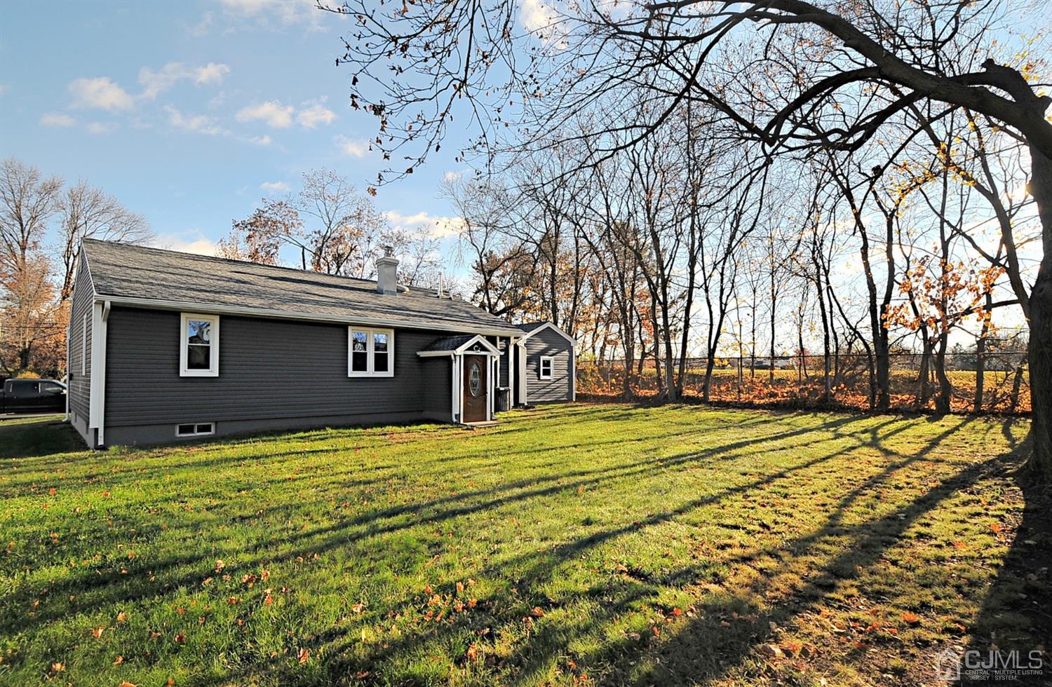 24 Prescott Street Edison, NJ 08817 - Photo 26 of 27 a view of a house with a yard