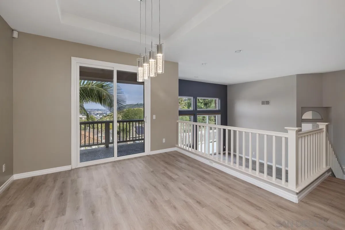 6013 Oakgate Row La Jolla, CA 92037 - Photo 23 of 50 a view of entryway with wooden floor