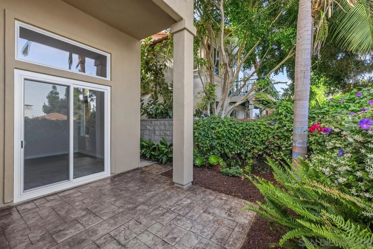 6013 Oakgate Row La Jolla, CA 92037 - Photo 40 of 50 front view of a house with a garden
