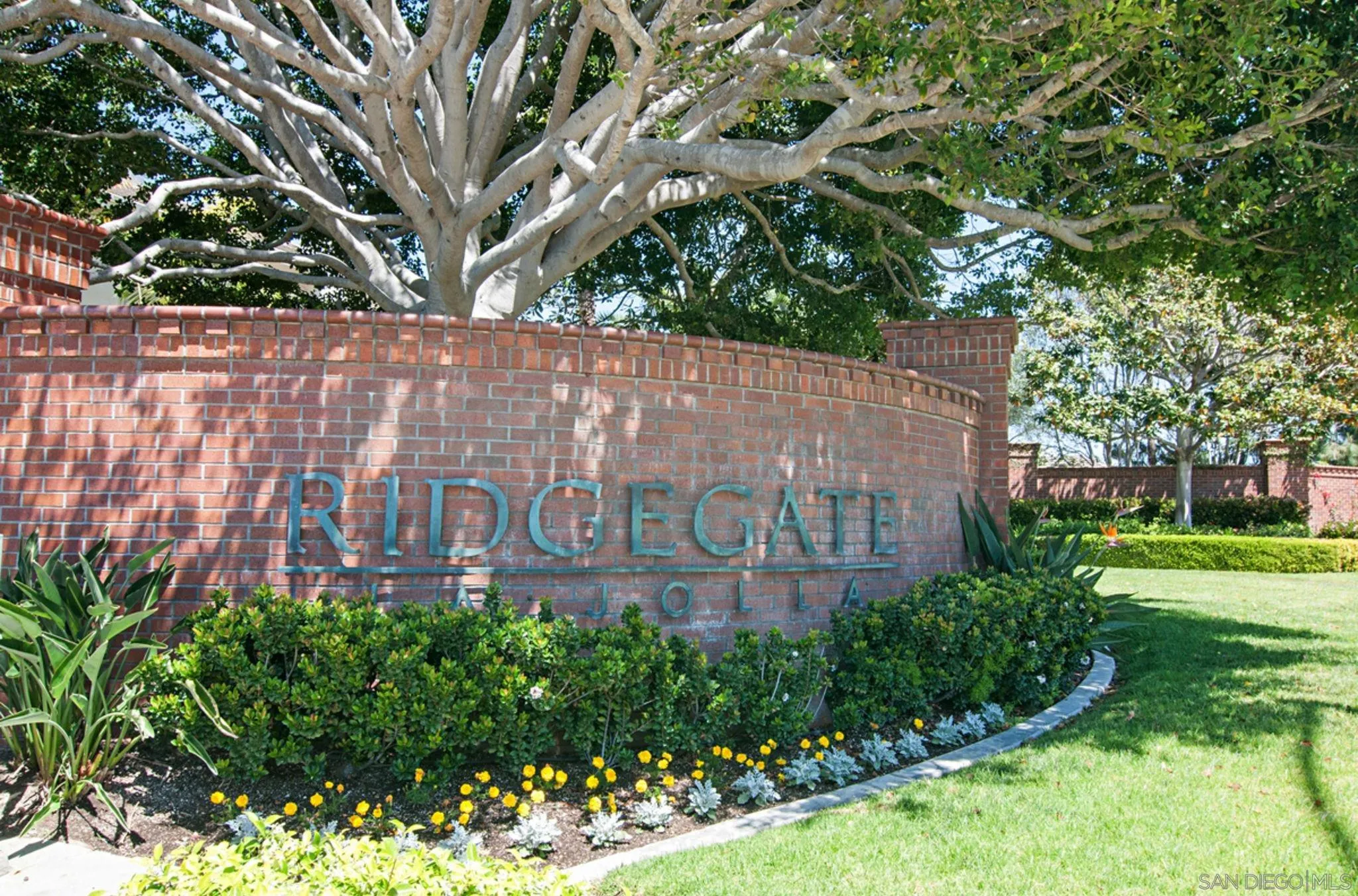 6013 Oakgate Row La Jolla, CA 92037 - Photo 41 of 50 a sign on the side of a building