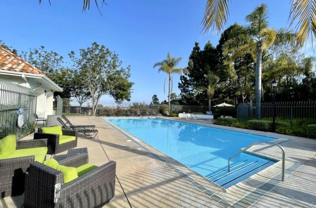 a view of a patio with swimming pool