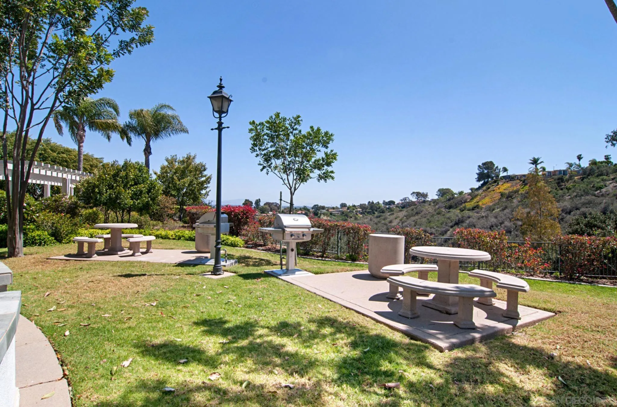 6013 Oakgate Row La Jolla, CA 92037 - Photo 48 of 50 a view of a house with swimming pool and sitting area