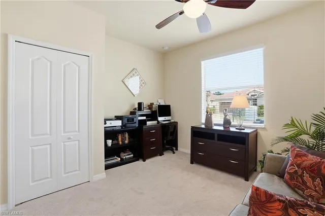 a room with a cabinets and a window