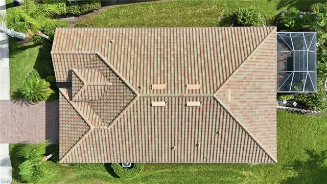 a view of a house with a garden