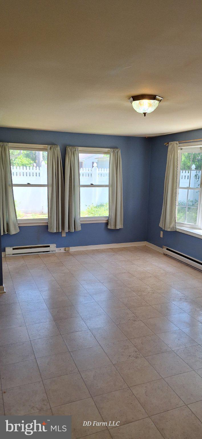 231 West Pine Street Georgetown, DE 19947 - Photo 14 of 26 Bright and airy living space awaits.