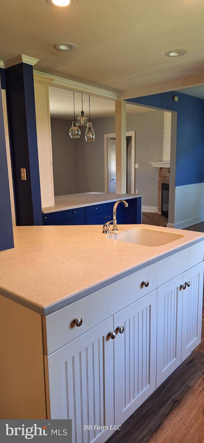231 West Pine Street Georgetown, DE 19947 - Photo 20 of 26 Modern kitchen with stylish accents.