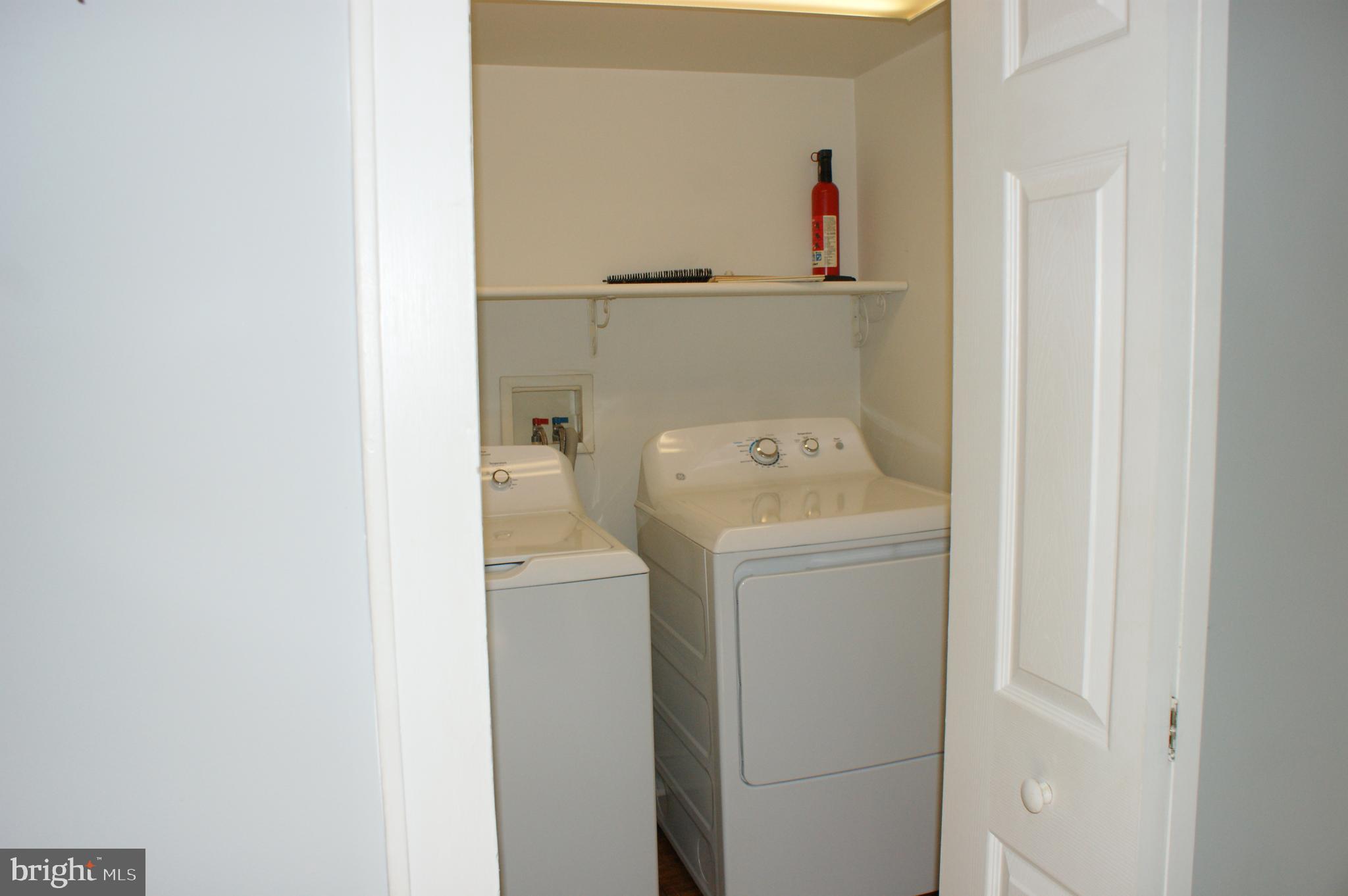 231 West Pine Street Georgetown, DE 19947 - Photo 7 of 26 a utility room with dryer and washer