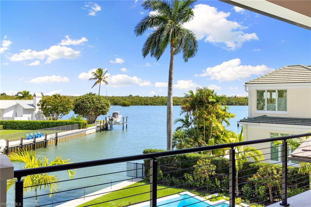 2345 Tarpon Road Naples, FL 34102 - Photo 27 of 43 a view of a lake from a balcony