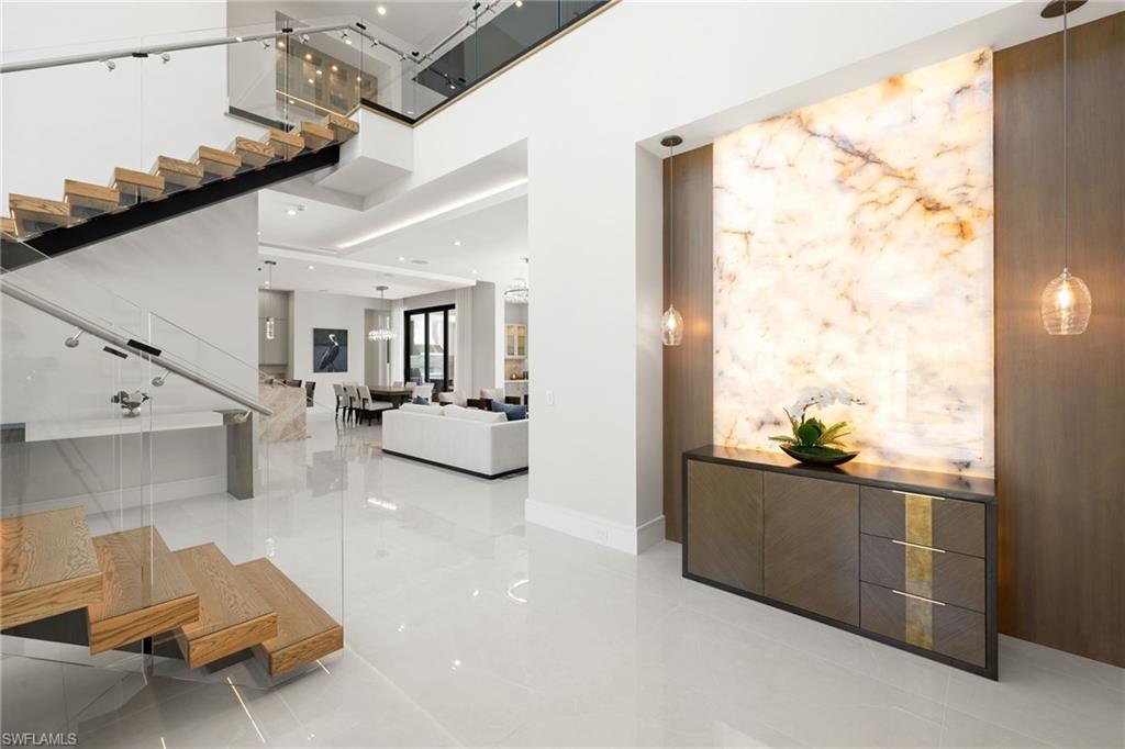 2345 Tarpon Road Naples, FL 34102 - Photo 4 of 43 a living room with furniture