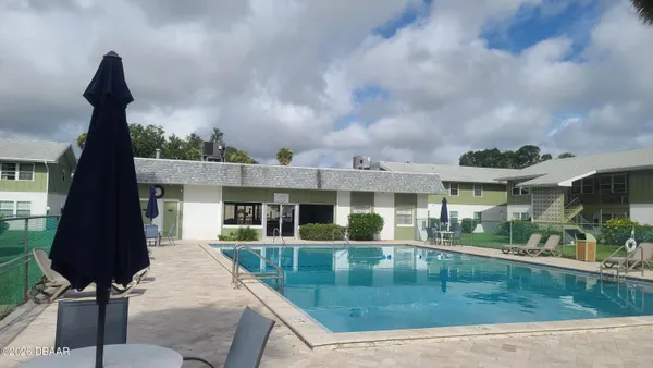 a view of backyard with green space