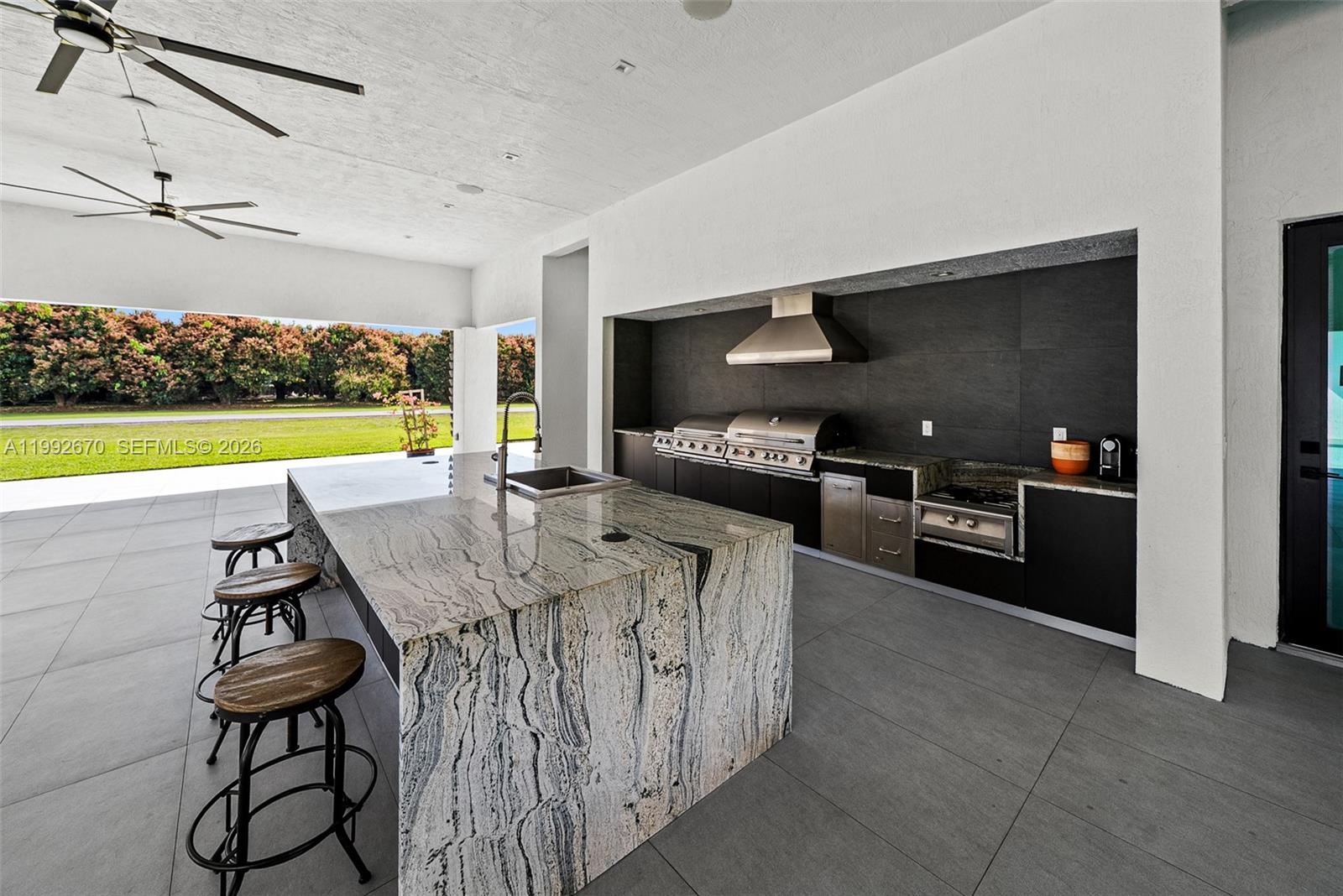 17950 Southwest 192nd Street Miami, FL 33187 - Photo 26 of 31 Fully Equipped Summer Kitchen