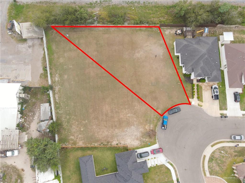 0 Canan Street Weslaco, TX 78596 - Photo 7 of 9 an aerial view of a house with a swimming pool