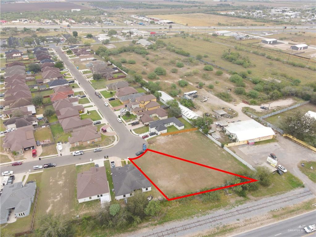 0 Canan Street Weslaco, TX 78596 - Photo 9 of 9 an aerial view of residential houses with outdoor space