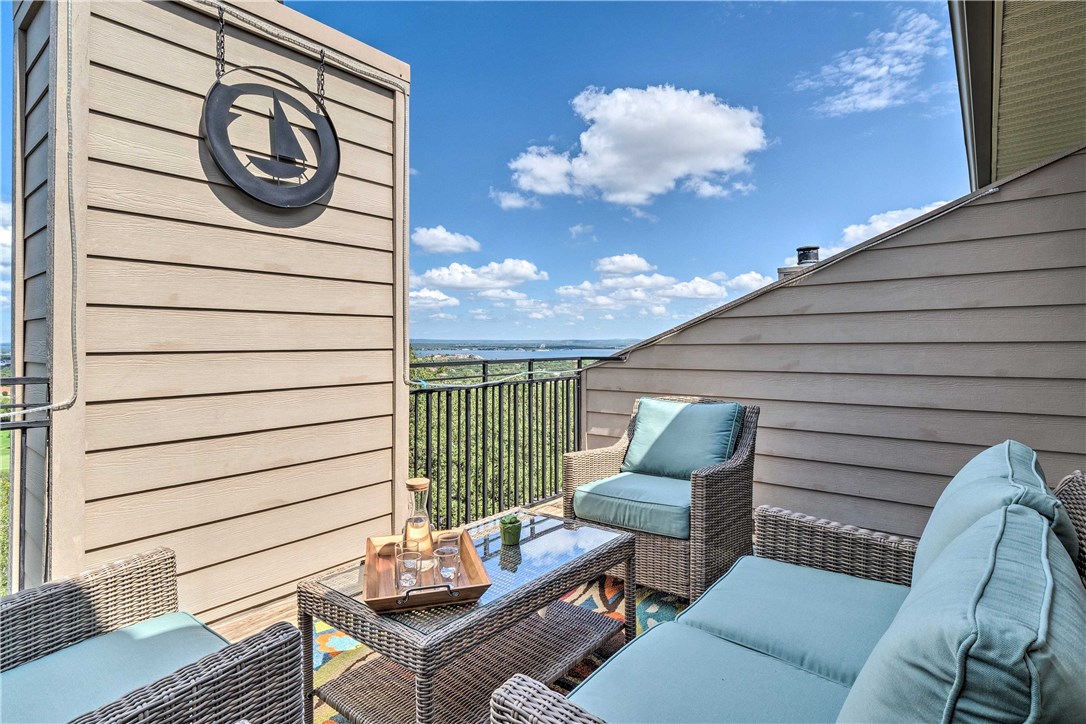 307 Poker Chip, Unit 122 Horseshoe Bay, TX 78657 - Photo 11 of 18 a view of a patio with couple of chairs