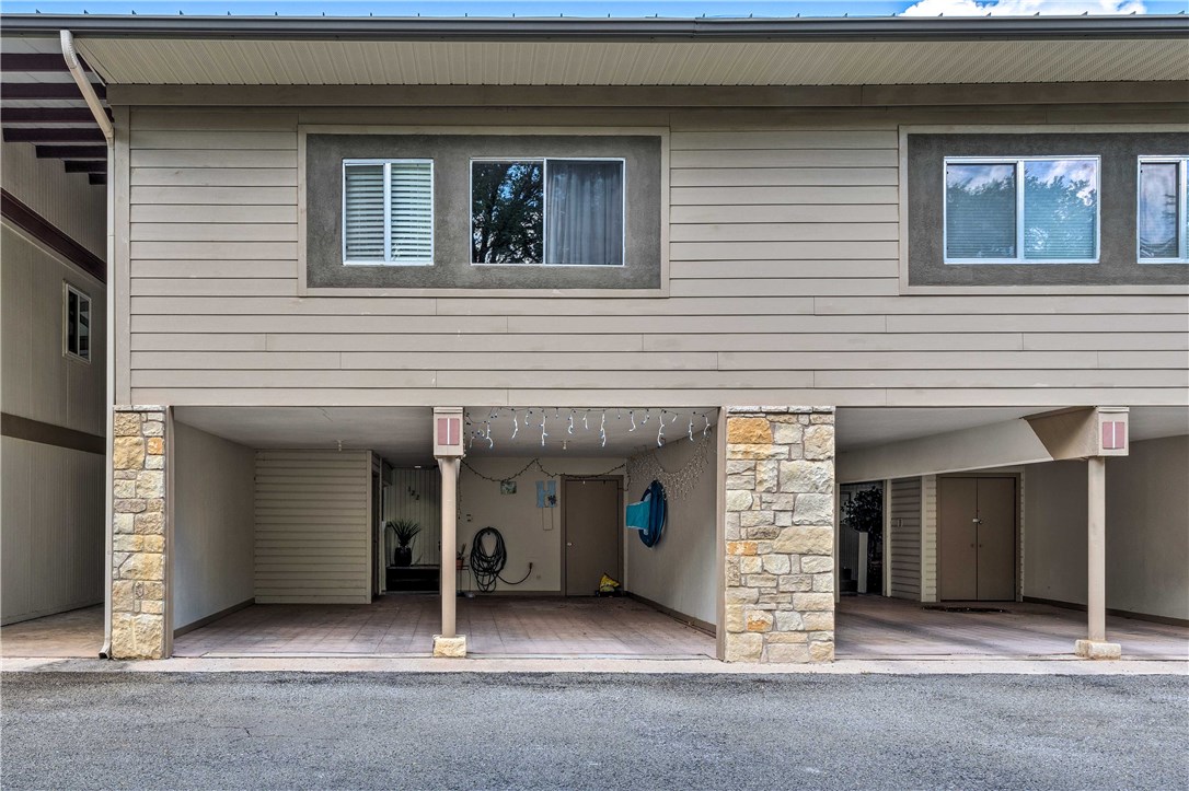 307 Poker Chip, Unit 122 Horseshoe Bay, TX 78657 - Photo 18 of 18 a view of a house with an outdoor space