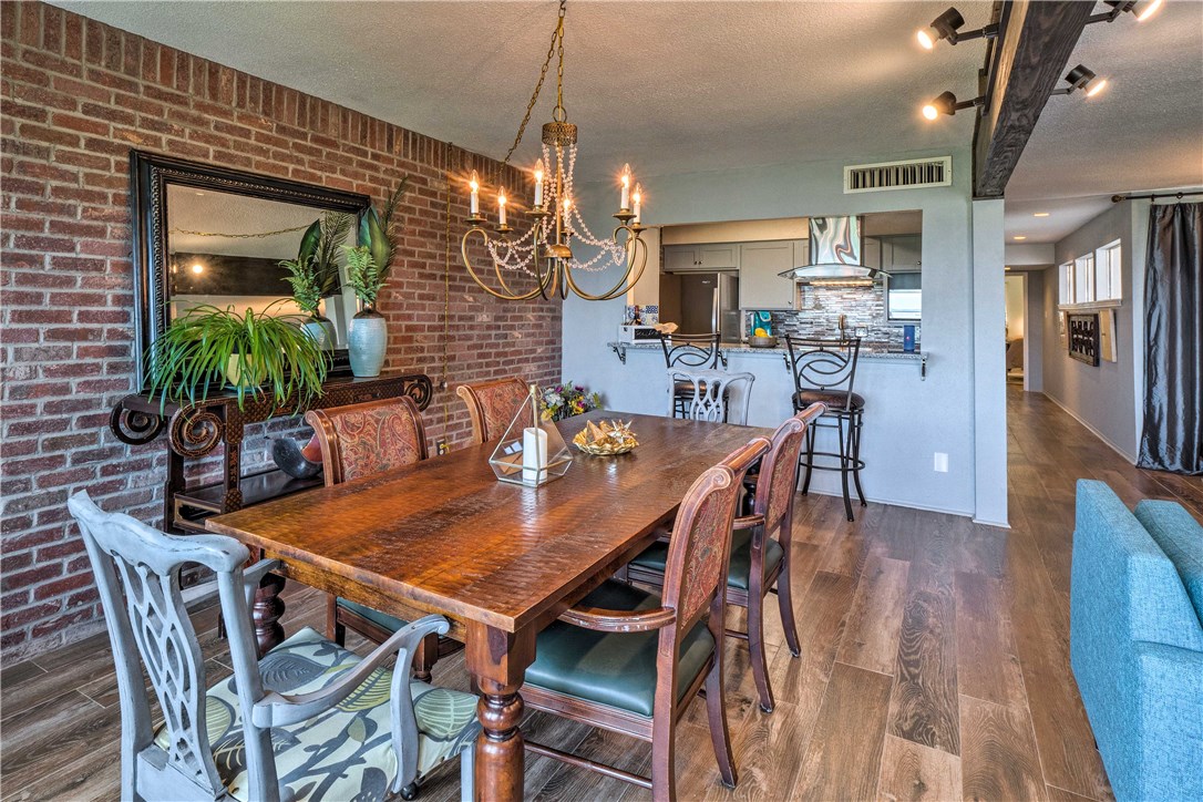 307 Poker Chip, Unit 122 Horseshoe Bay, TX 78657 - Photo 4 of 18 a view of a dining room with furniture