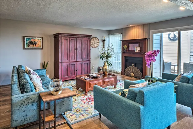 a view of a patio with couple of chairs