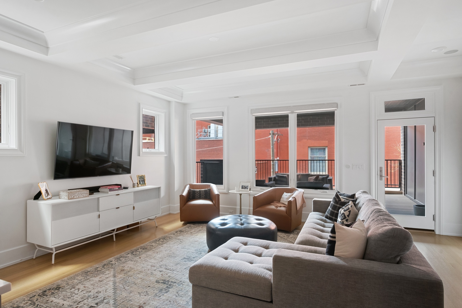 2020 North Howe Street, Unit 3S Chicago, IL 60614 - Photo 13 of 31 a living room with furniture and a flat screen tv
