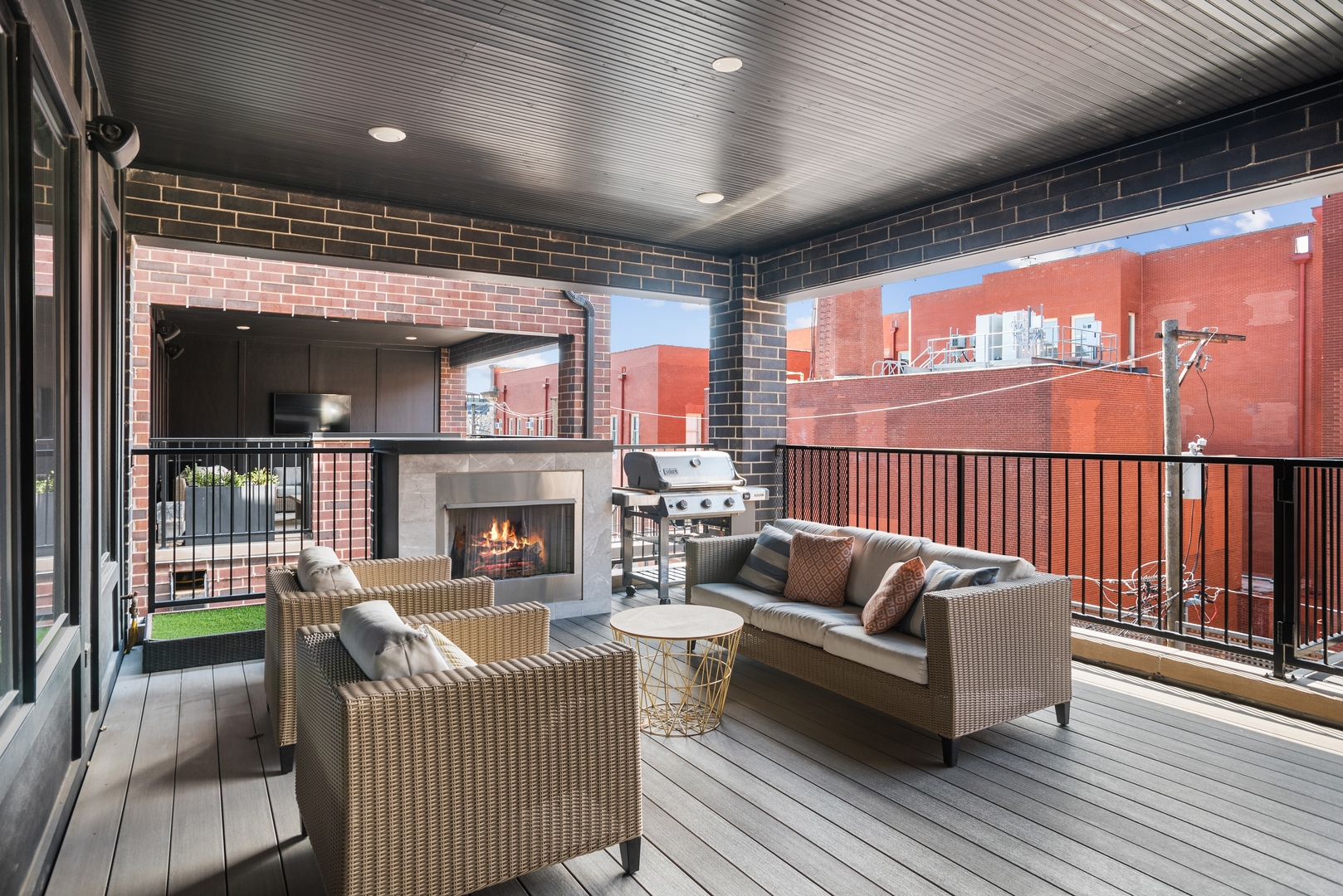 2020 North Howe Street, Unit 3S Chicago, IL 60614 - Photo 16 of 31 a outdoor living space with patio furniture and a fireplace