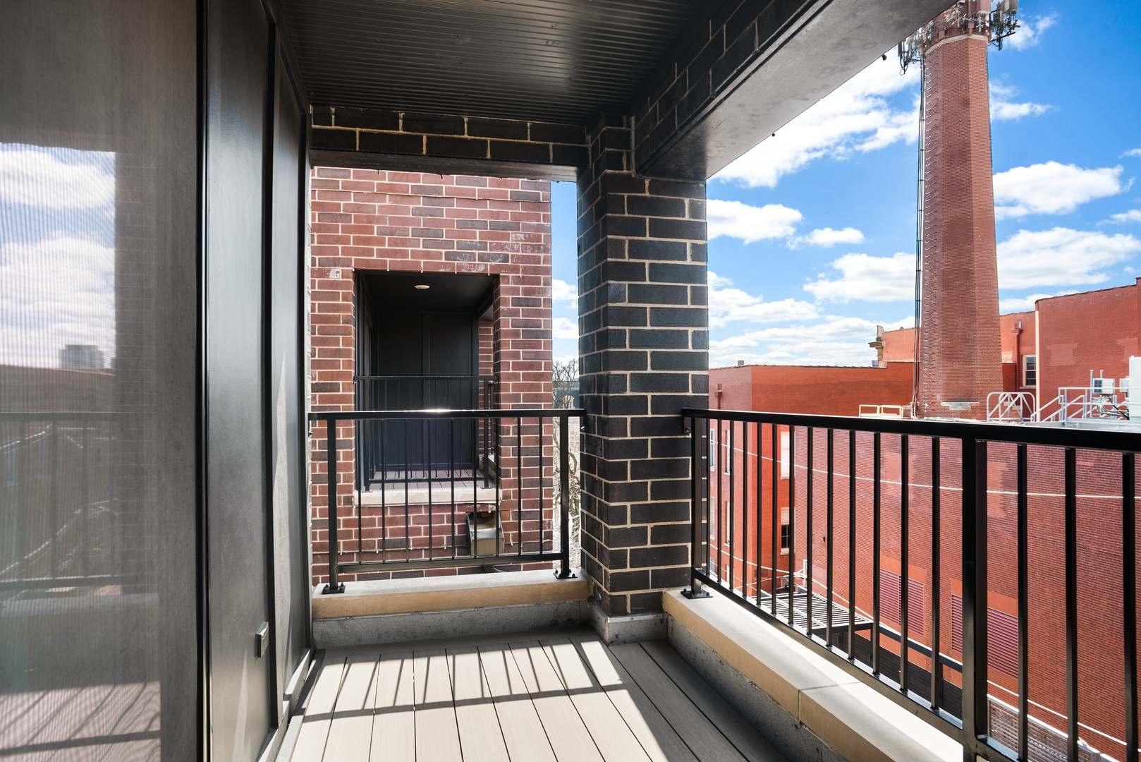 2020 North Howe Street, Unit 3S Chicago, IL 60614 - Photo 19 of 31 a view of a balcony with a floor to ceiling window