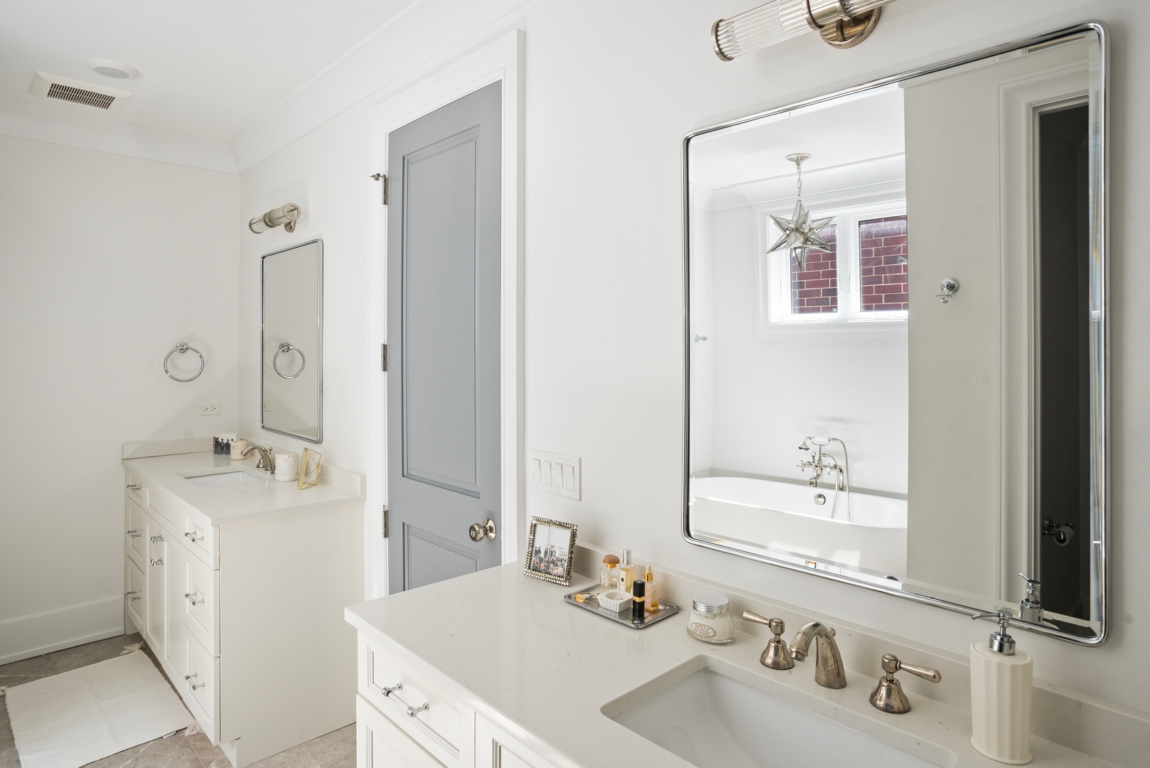 2020 North Howe Street, Unit 3S Chicago, IL 60614 - Photo 20 of 31 a bathroom with a sink vanity and mirror