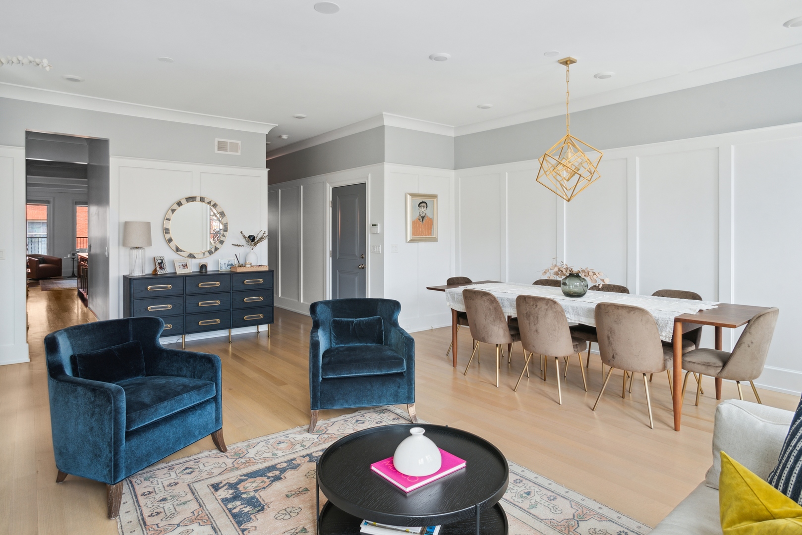 2020 North Howe Street, Unit 3S Chicago, IL 60614 - Photo 3 of 31 a living room with lots of furniture and a chandelier