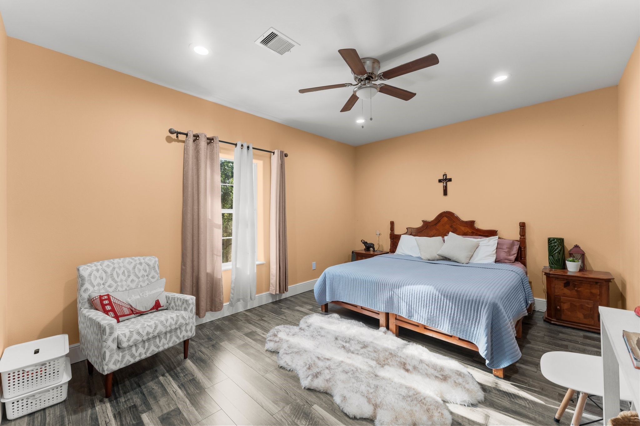 11053 Heritage Ranch Road Conroe, TX 77303 - Photo 27 of 42 a bedroom with a bed and dresser