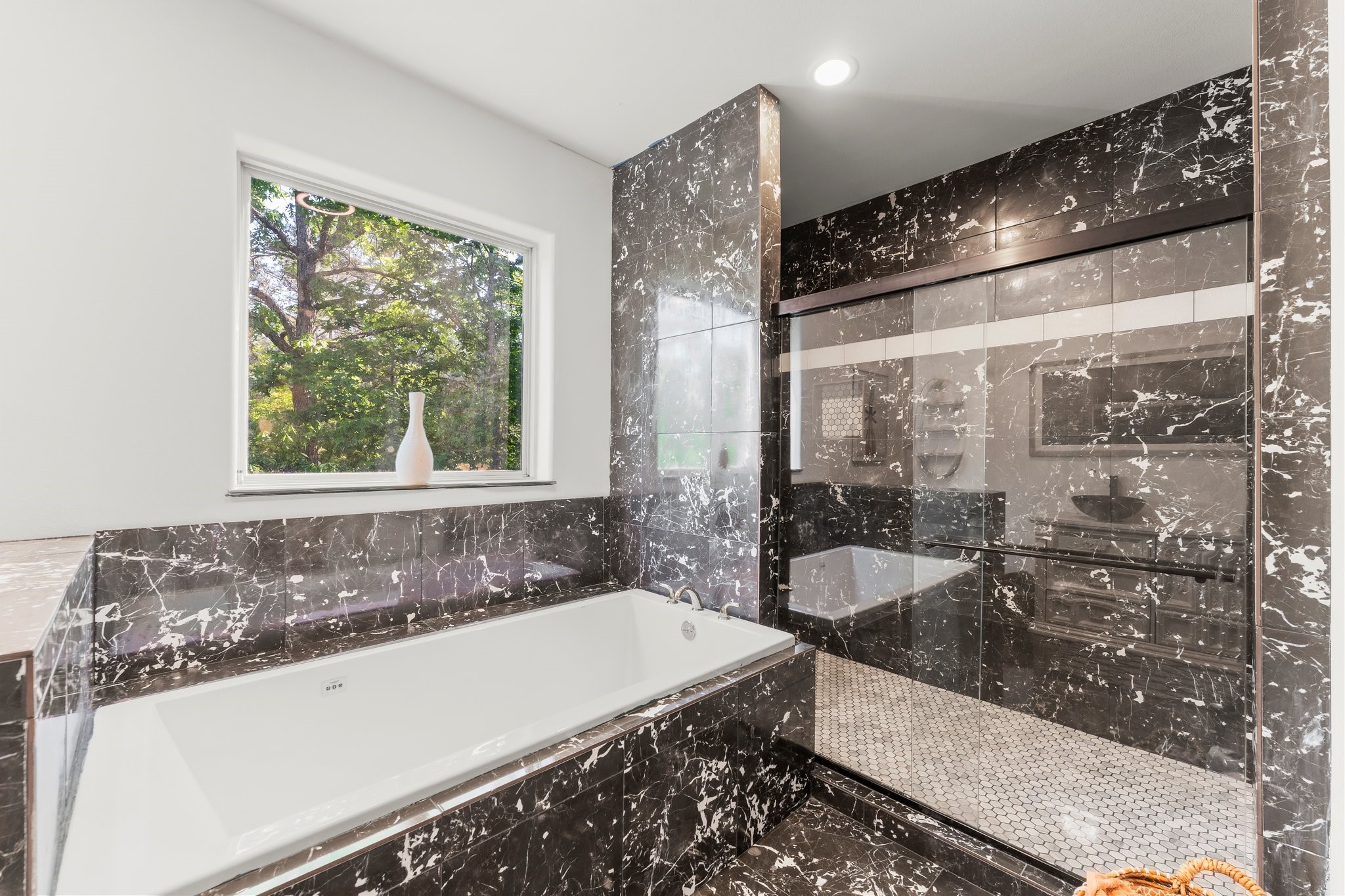 11053 Heritage Ranch Road Conroe, TX 77303 - Photo 31 of 42 a bath tub sitting next to a window