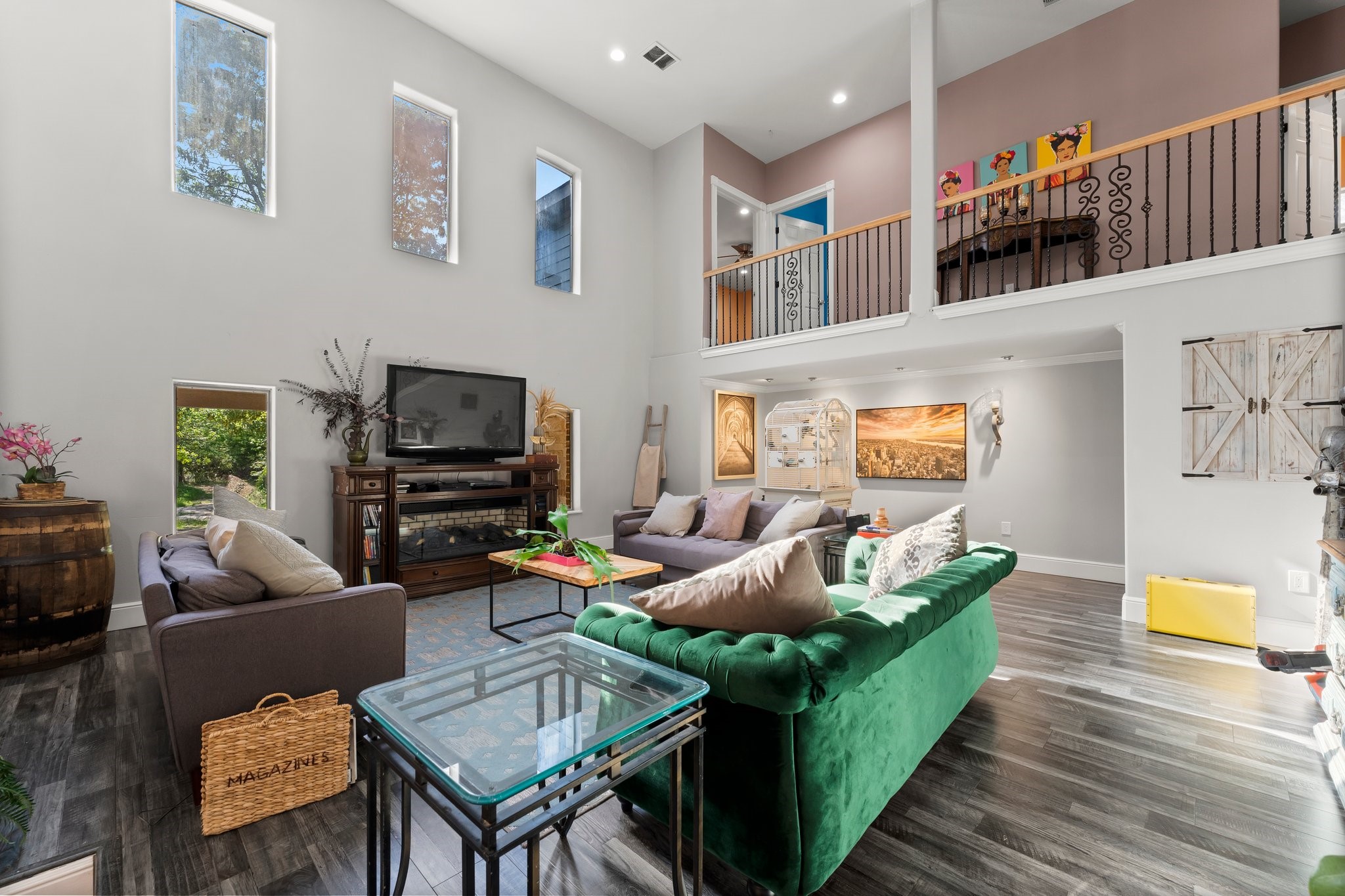 11053 Heritage Ranch Road Conroe, TX 77303 - Photo 9 of 42 a living room with furniture and a flat screen tv