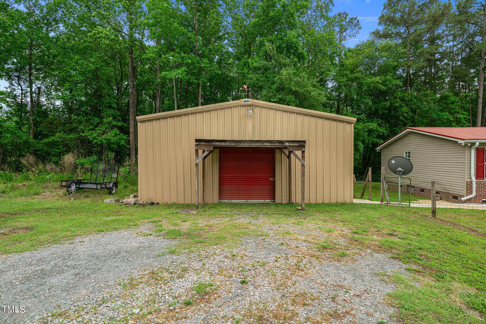 150 Box Elder Terrace Cameron, NC 28326 - Photo 23 of 23 a house with a outdoor space