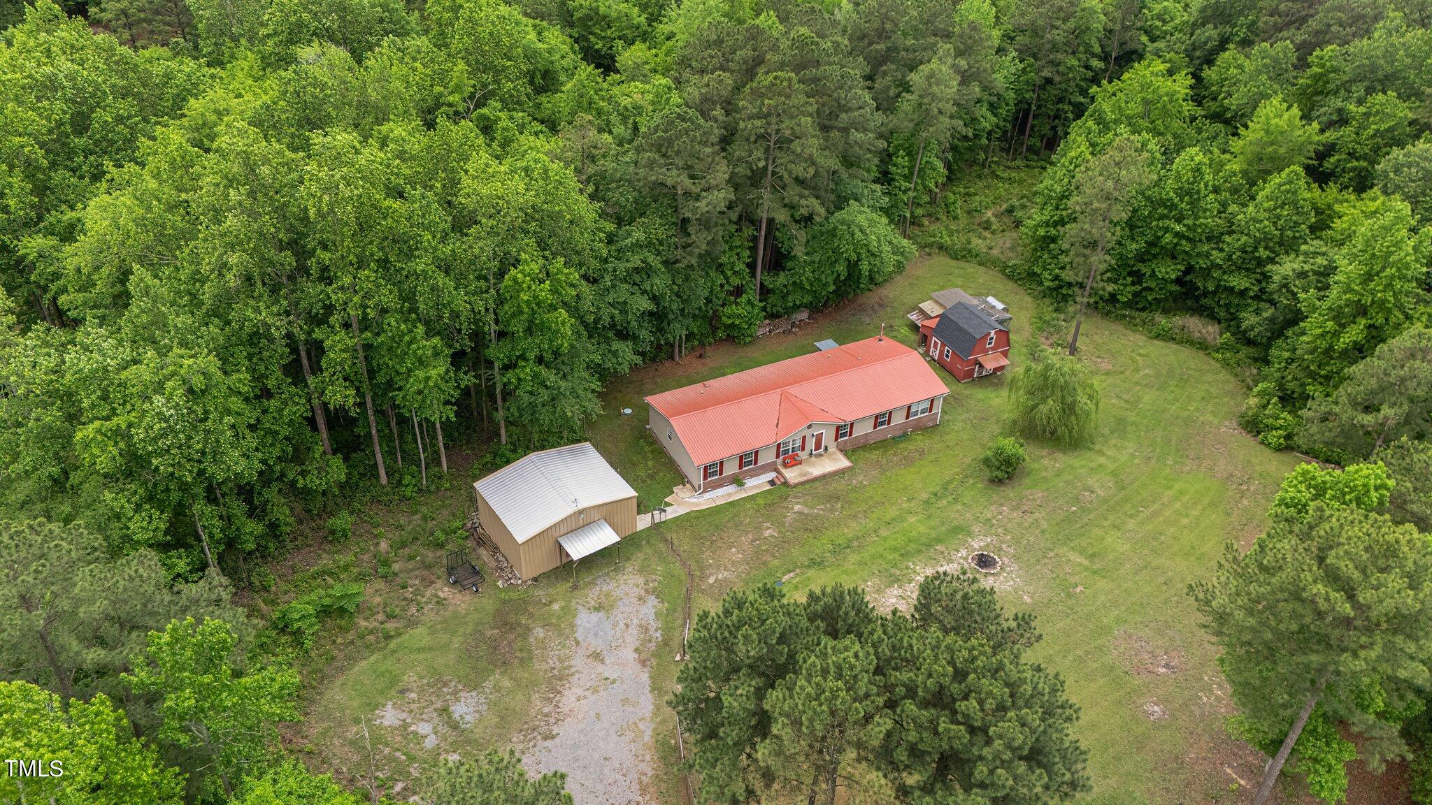 150 Box Elder Terrace Cameron, NC 28326 - Photo 3 of 23 an aerial view of a house with a yard