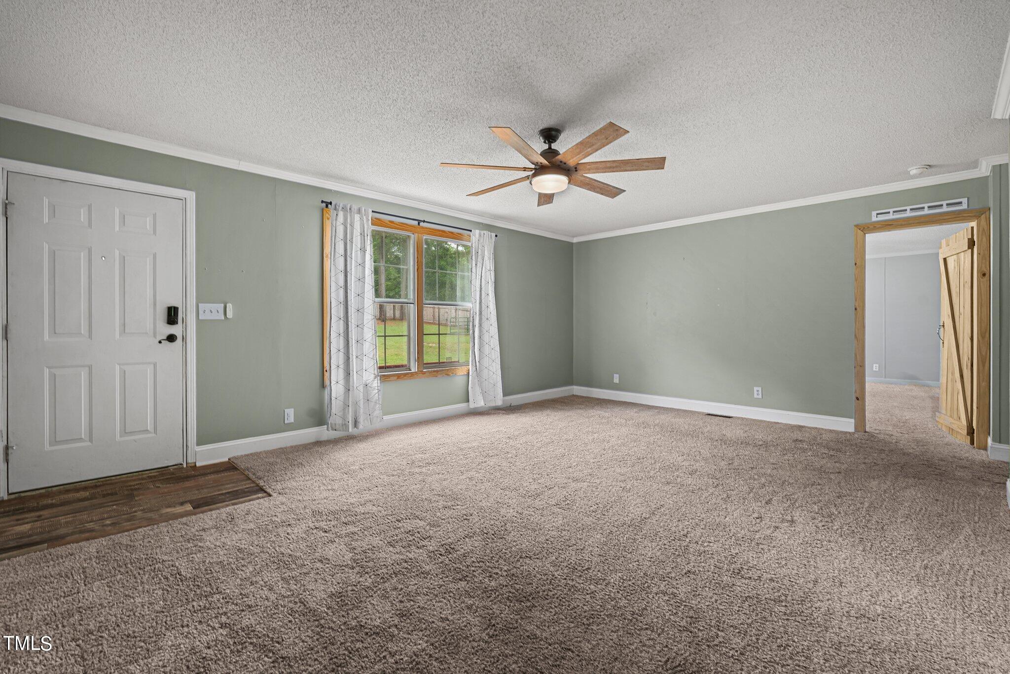 150 Box Elder Terrace Cameron, NC 28326 - Photo 10 of 23 a view of a big room with closet and windows