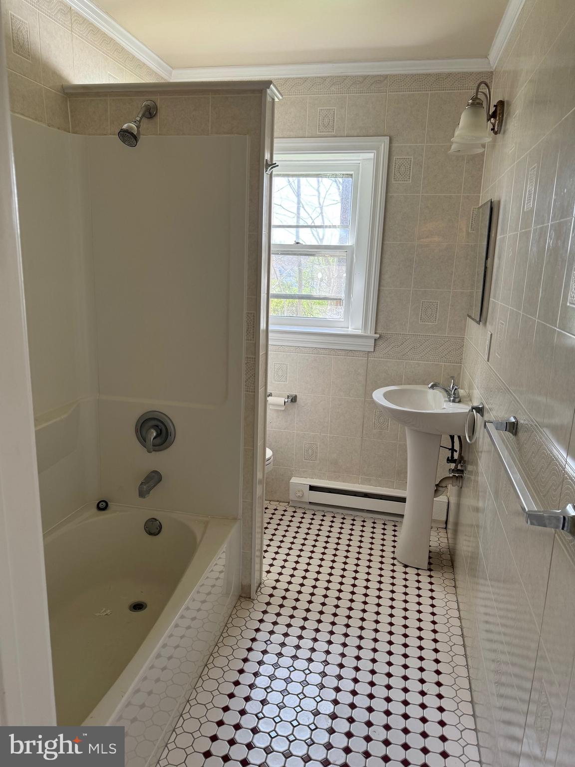 20 Black Horse Road, Unit 5 Paradise, PA 17562 - Photo 3 of 7 a bathroom with a sink a toilet and shower