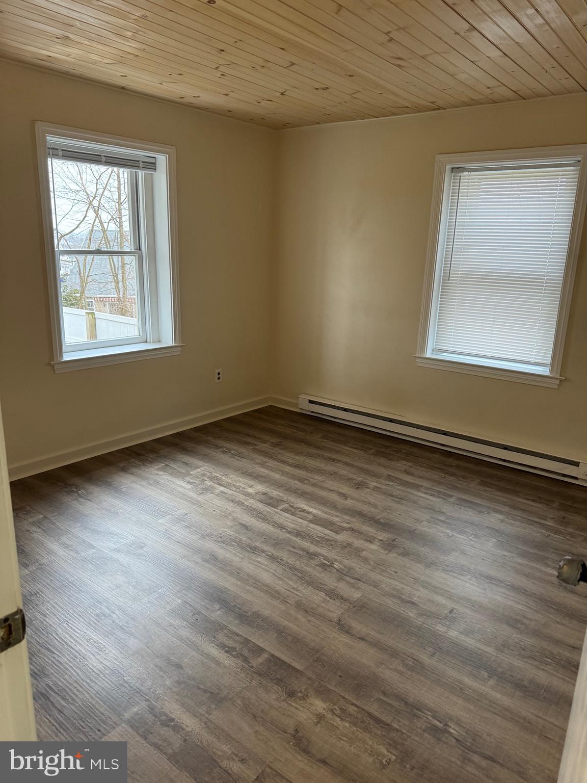 20 Black Horse Road, Unit 5 Paradise, PA 17562 - Photo 6 of 7 an empty room with wooden floor and windows