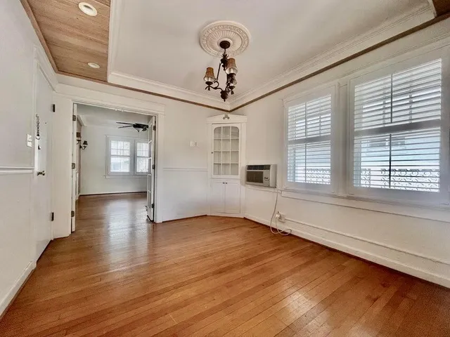 a view of livingroom with hardwood floor and a ceiling fan