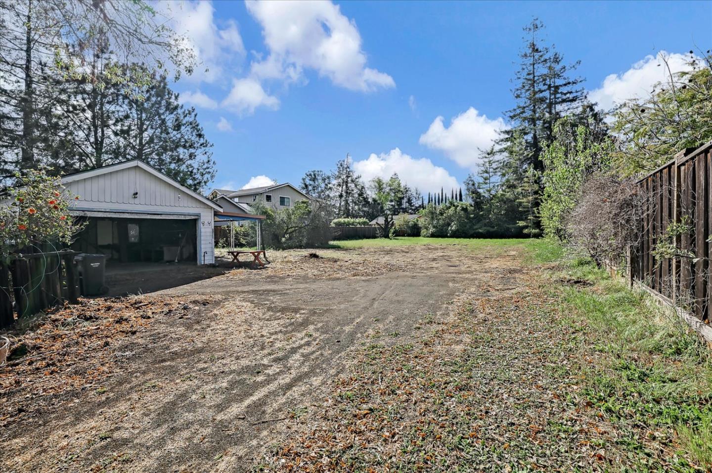 679 Sleeper Avenue Mountain View, CA 94040 - Photo 11 of 51 a front view of a house with a yard and garage