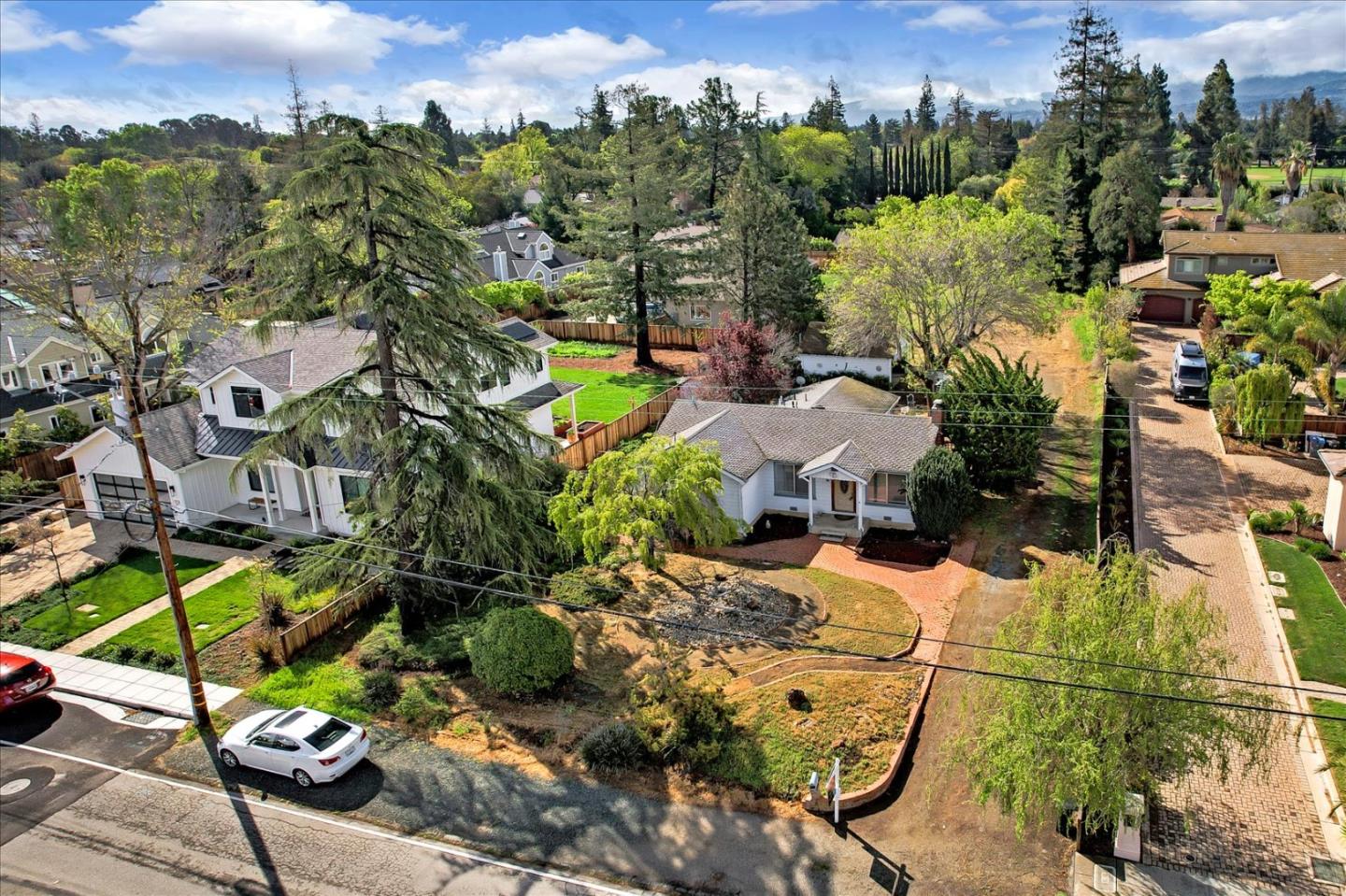 679 Sleeper Avenue Mountain View, CA 94040 - Photo 23 of 51 an aerial view of a house with a yard and lake view