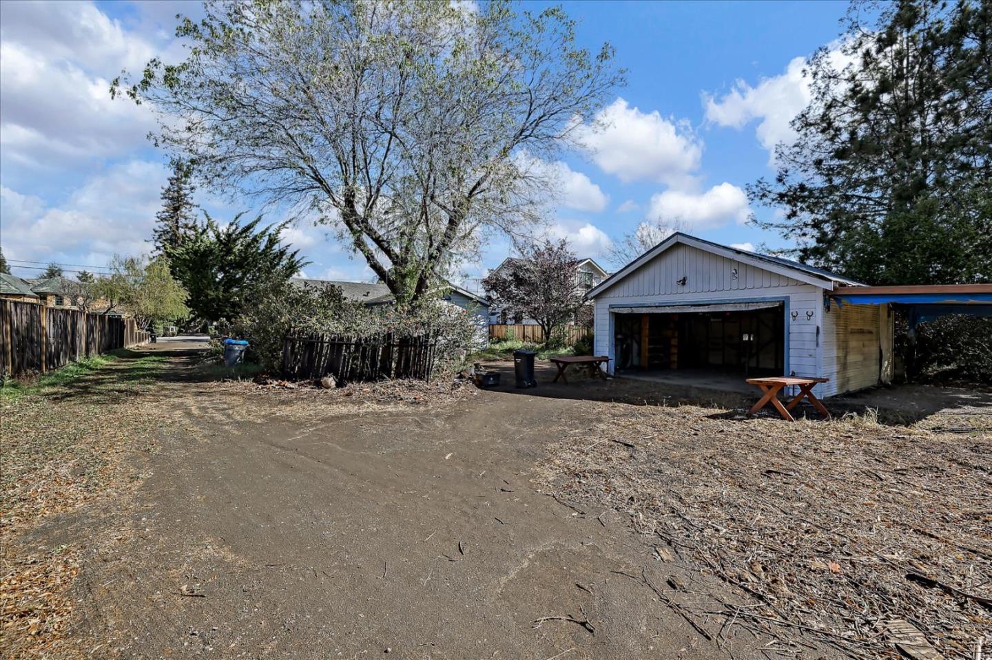 679 Sleeper Avenue Mountain View, CA 94040 - Photo 3 of 51 a front view of a house with a yard and garage