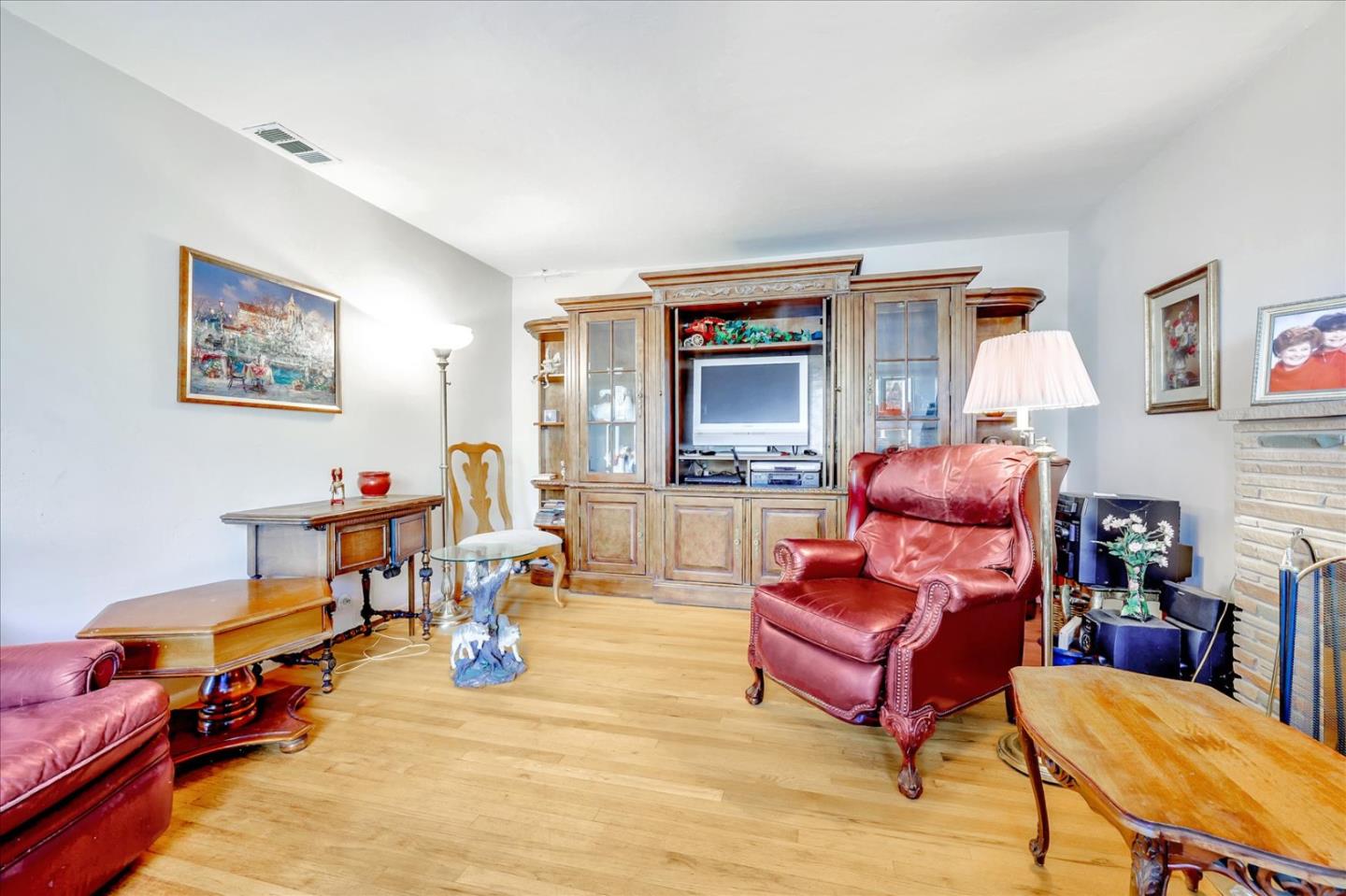 679 Sleeper Avenue Mountain View, CA 94040 - Photo 32 of 51 a living room with furniture and a flat screen tv