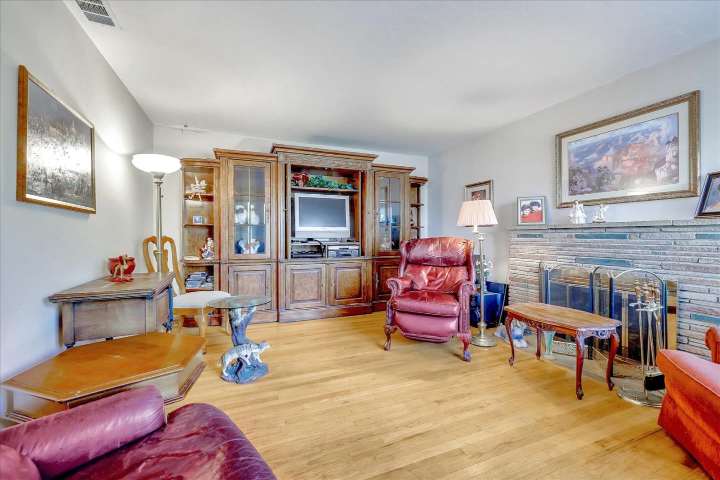 679 Sleeper Avenue Mountain View, CA 94040 - Photo 33 of 51 a living room with furniture and a flat screen tv