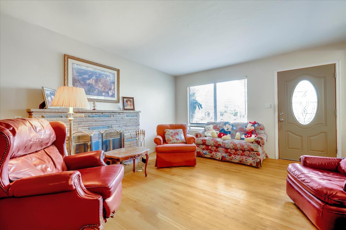 679 Sleeper Avenue Mountain View, CA 94040 - Photo 34 of 51 a living room with furniture a fireplace and a large window
