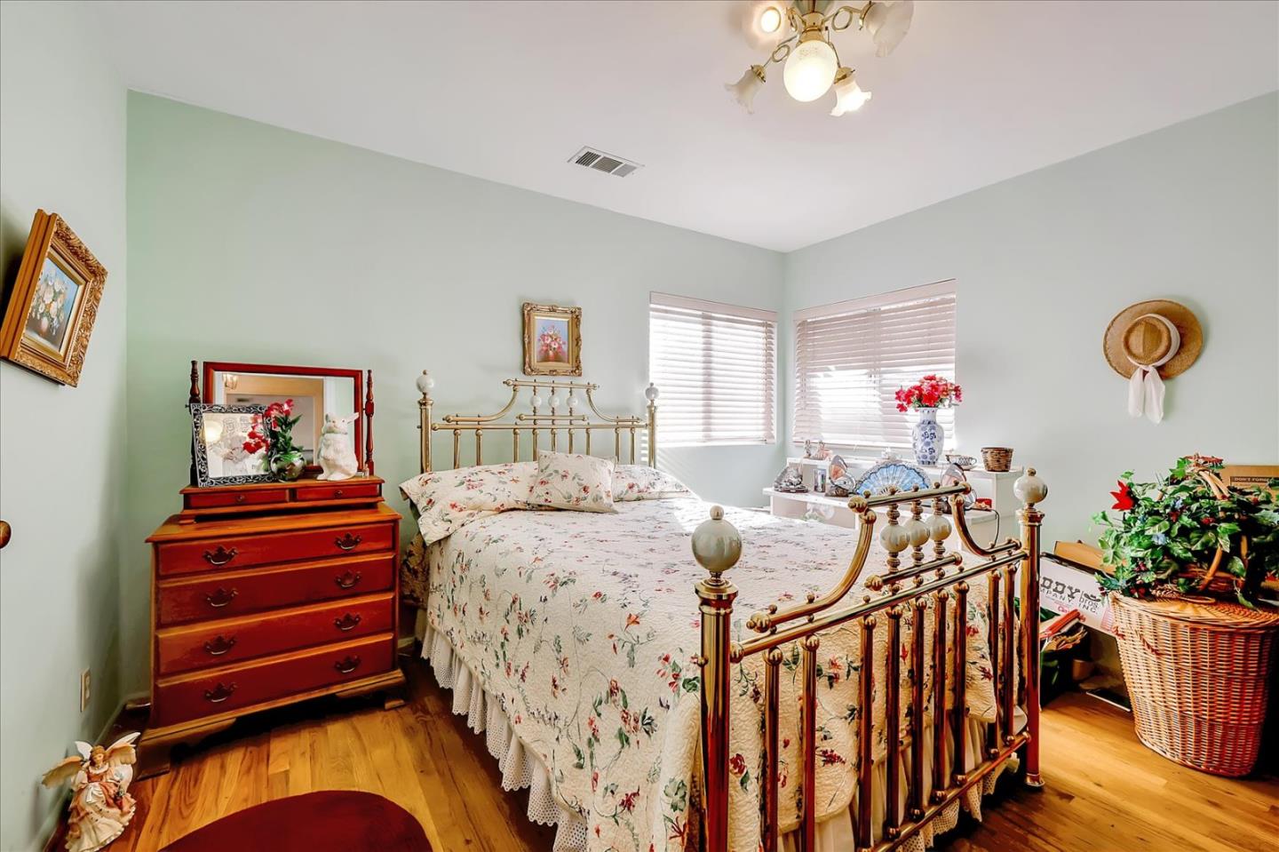 679 Sleeper Avenue Mountain View, CA 94040 - Photo 44 of 51 a bedroom with furniture and a chandelier