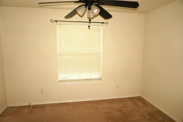 a view of a room with a walk in closet
