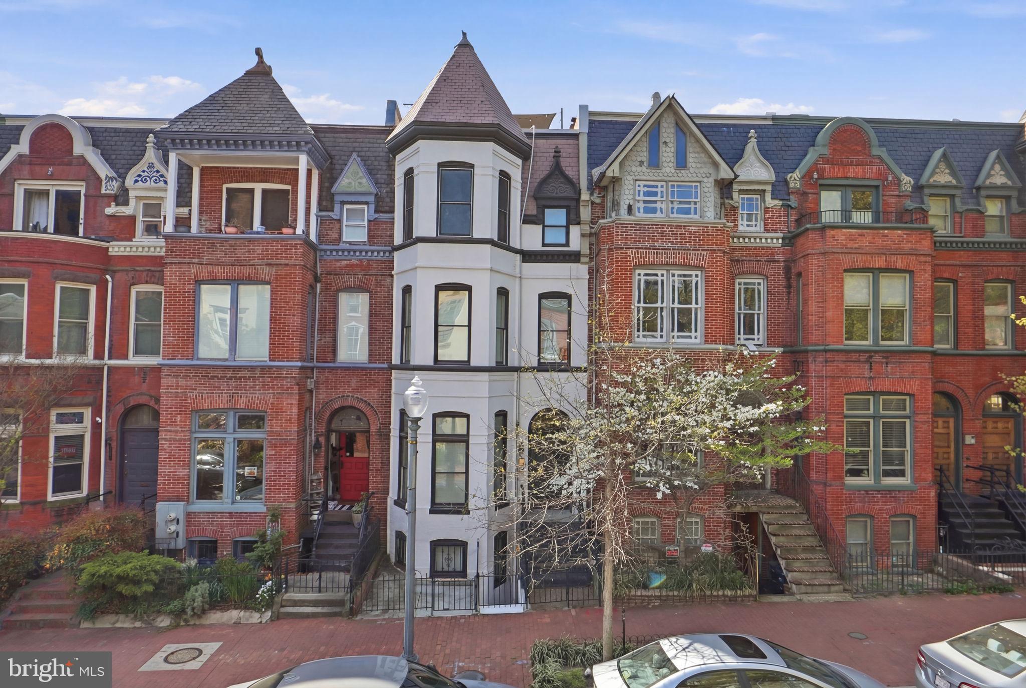 1126 5th Street Northwest, Unit 1 Washington, DC 20001 - Photo 27 of 27 front view of a brick house with a yard
