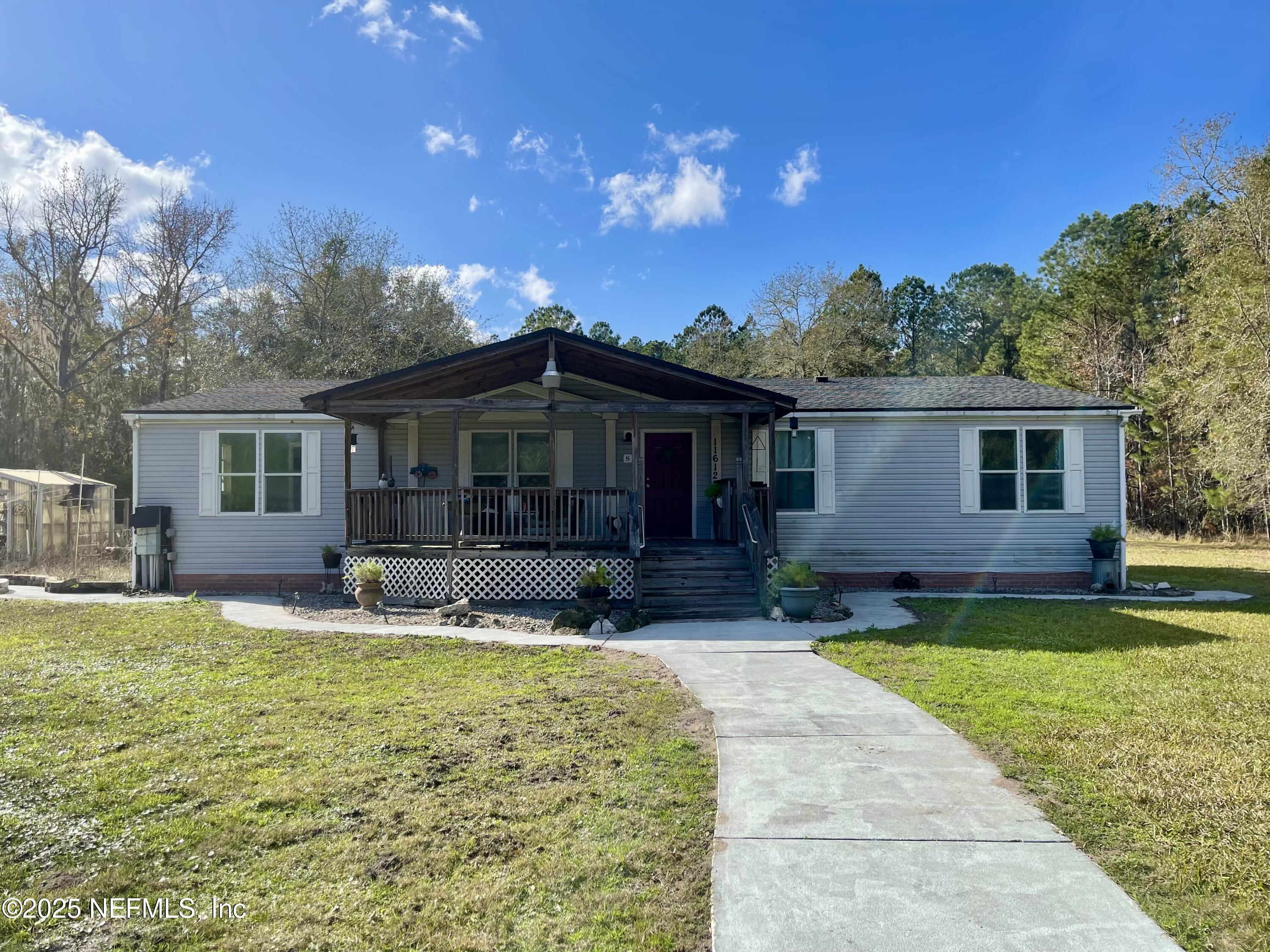 11612 Chapparell Road Jacksonville, FL 32218 - Photo 1 of 10 Main