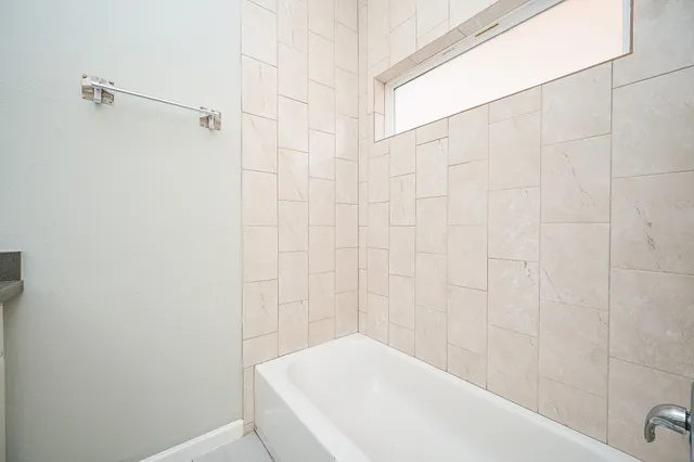 a bathroom with a bathtub