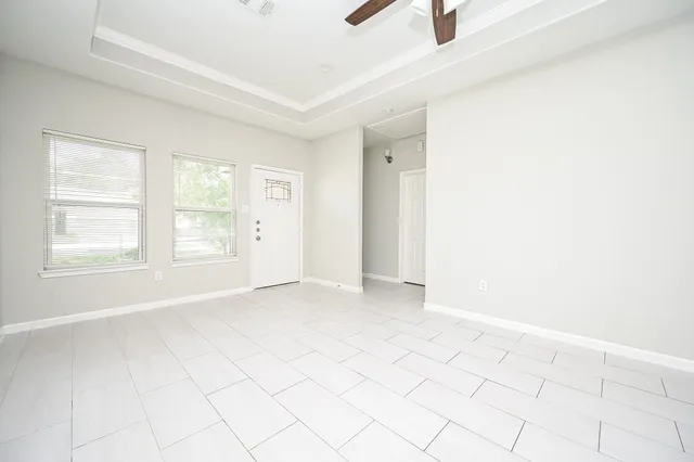 an empty room with windows