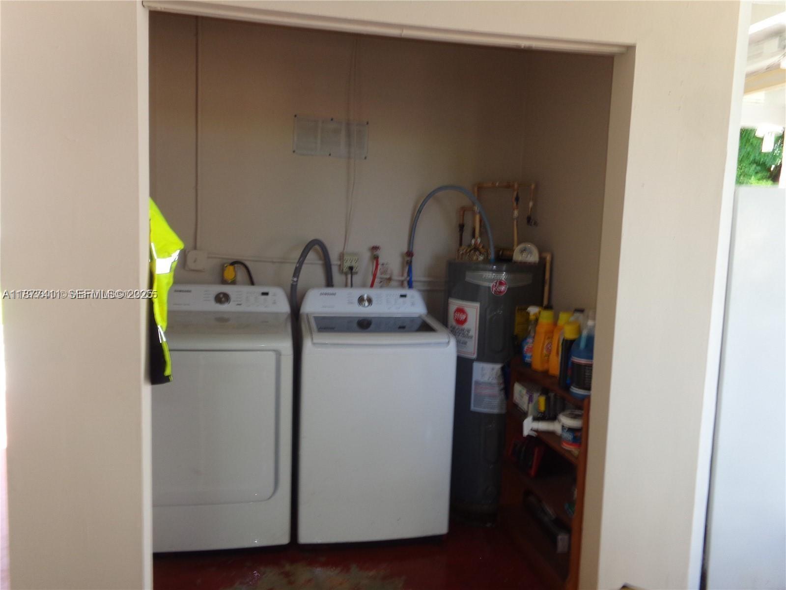 10020 Dominican Drive Cutler Bay, FL 33189 - Photo 12 of 22 a utility room with dryer and washer