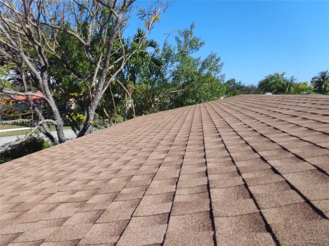 a view of backyard with green space