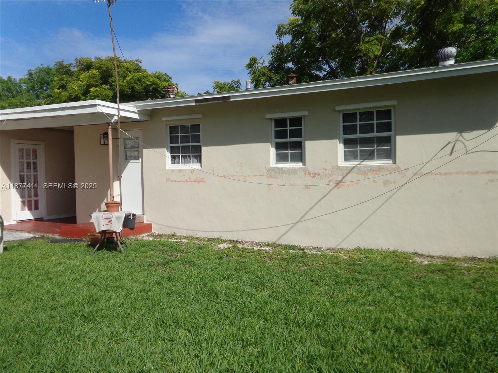 10020 Dominican Drive Cutler Bay, FL 33189 - Photo 22 of 22 a view of a house with a yard